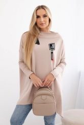 Bluza oversize z asymetrycznymi bokami beżowa. Brązowe bluzy damskie KESI, l, bez wzorów, z bawełny, bez kaptura. Za 209.11 zł.