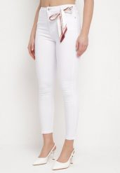Białe Spodnie Skinny z Wysokim Stanem i Kokardką przy Pasie Diorene. Białe rurki damskie Born2be, bez wzorów, z jeansu, z podwyższonym stanem. Za 54.99 zł.