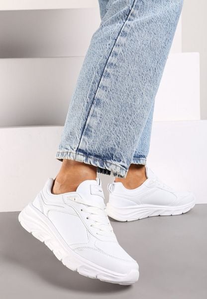 Białe Casualowe Buty Sportowe Sneakersy na Płaskiej Tłoczonej Podeszwie Velanitta. Białe obuwie sportowe casual damskie Renee, z jeansu, bez zapięcia. Za 109.99 zł.