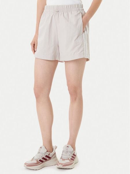 Adidas Szorty sportowe Essentials 3-Stripes JC8165 Beżowy Loose Fit. Brązowe spodenki sportowe damskie Adidas, xs, bez wzorów, z syntetyku. Za 99.99 zł.