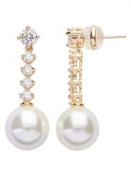 U.S. Polo Assn. Pozłacane kolczyki-wkrętki z kryształami i perłami rozmiar: onesize. Białe kolczyki damskie U.S. Polo Assn., z kryształem, metalowe. Za 108.99 zł.