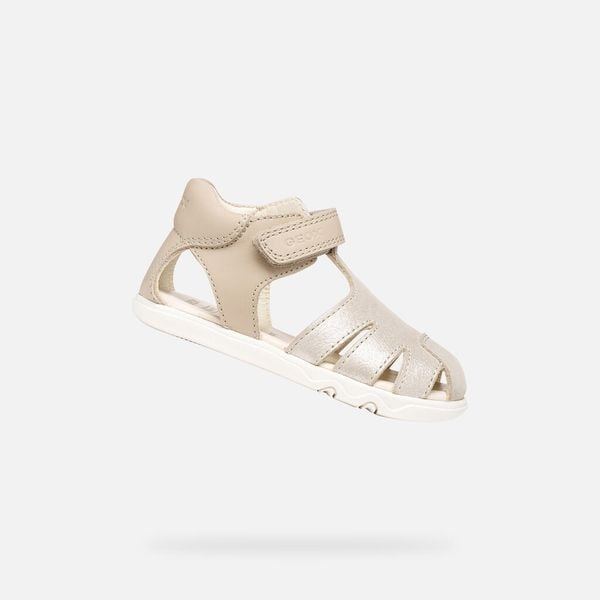 Sandały GEOX B SANDAL STEPPIEUP Złoty. Brązowe sandały damskie Geox, bez wzorów, ze skóry, bez obcasa, bez zapięcia. Za 189.99 zł.