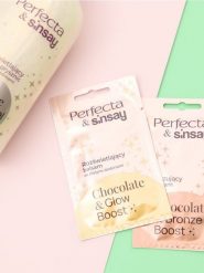 Balsam do ciała Sinsay x Perfecta - złoty. Żółte body i gorsety Sinsay, bez wzorów. W wyprzedaży za 2.49 zł.