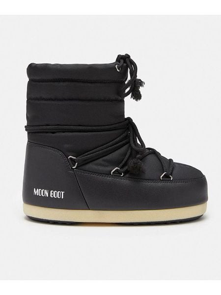Moon Boot Botki zimowe "Evx" w kolorze czarnym rozmiar: 39-40. Czarne botki damskie Moon Boot, na zimę, z materiału, bez obcasa, bez zapięcia. Za 438.21 zł.