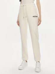 Tommy Hilfiger Spodnie dresowe Monotype WW0WW41572 Beżowy Regular Fit. Brązowe spodnie dresowe damskie Tommy Hilfiger, s, bez wzorów, z bawełny. Za 389.99 zł.