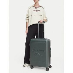 Walizka średnia Reebok. Zielone walizki Reebok, bez wzorów, średnie. Za 269.99 zł.