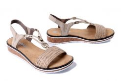 RIEKER V3662-62 beige, sandały damskie. Brązowe sandały damskie Rieker, bez wzorów, bez obcasa, na koturnie, bez zapięcia. Za 271.92 zł.