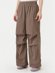 Adidas Spodnie dresowe Essentials Ripstop JD0783 Beżowy Loose Fit. Brązowe spodnie dresowe damskie Adidas, xl, bez wzorów, z dresówki. Za 169.99 zł.