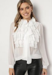 Biała Koszula z Prześwitującego Materiału z Falbankami i Kwiatowymi Detalami Raitra. Białe koszule damskie Born2be, m, z aplikacjami, z jeansu, eleganckie, bez kołnierzyka, bez ramiączek. Za 159.99 zł.