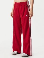 Adidas Spodnie dresowe Pinstripe Firebird Loose Trackpant KS9977 Czerwony Wide Leg. Czerwone spodnie dresowe damskie Adidas, s, bez wzorów, z dresówki. Za 299.99 zł.