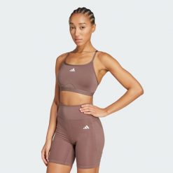 Biustonosz Aeroreact Training 3-Stripes. Brązowe biustonosze sportowe damskie Adidas, bez wzorów, z materiału. W wyprzedaży za 116.22 zł.