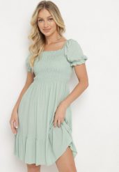Zielona Sukienka z Bawełny z Elastycznym Dekoltem i Falbanką Loridia. Zielone sukienki damskie Born2be, bez wzorów, z bawełny, eleganckie, bez ramiączek. Za 59.99 zł.