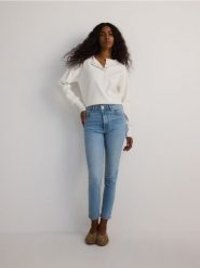 Jeansy slim fit mid rise - niebieski. Niebieskie jeansy damskie Reserved. W wyprzedaży za 79.99 zł.