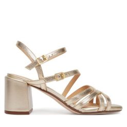 Sandały Clarks. Żółte sandały damskie Clarks, bez wzorów, bez obcasa, na słupku, bez zapięcia. Za 389.99 zł.