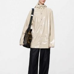 Kurtka RAINS JACKET W3 Jasnobrązowy. Brązowe kurtki damskie Rains, xs, bez wzorów, z syntetyku, bez kaptura. Za 213.99 zł.