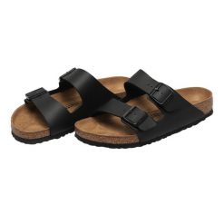 Skórzane Sandały Unisex Dla Dorosłych Arizona. Czarne sandały damskie Birkenstock, bez wzorów, bez obcasa, bez zapięcia. Za 523.99 zł.