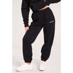 Spodnie fitness damskie Gym Glamour dresowe. Czarne spodnie dresowe damskie GYM GLAMOUR, s, bez wzorów, z dresówki. Za 189.99 zł.