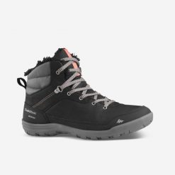 Buty turystyczne damskie Quechua SH100 Mid wodoodporne. Czarne obuwie trekkingowe damskie QUECHUA, z kauczuku, przed kolano, bez zapięcia. Za 159.99 zł.