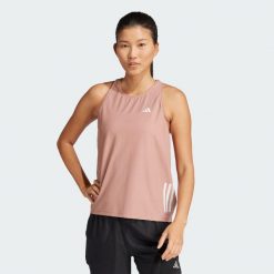 Koszulka bez rękawów Own The Run. Czerwone koszulki damskie Adidas, xs, bez wzorów, z materiału, bez kołnierzyka, bez ramiączek. Za 159.00 zł.