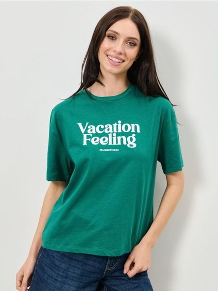 Bawełniana koszulka z napisem - ciemny turkus. Koszulki damskie Sinsay, l, bez wzorów, z bawełny, bez kołnierzyka, bez ramiączek. Za 29.99 zł.