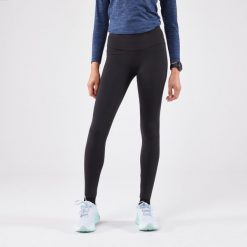 Legginsy do biegania damskie Kiprun Run 500 Warm ocieplane. Czarne legginsy damskie KIPRUN, l, bez wzorów, z elastanu. Za 139.99 zł.