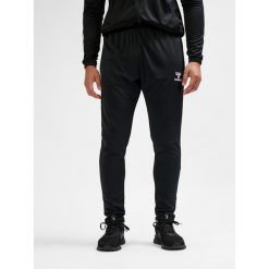 SPODNIE hmlESSENTIAL TRAINING PANTS. Czarne spodnie dresowe damskie Hummel, m, bez wzorów, z dresówki, do piłki nożnej. Za 100.00 zł.