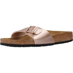 Klapki damskie Birkenstock Madrid. Żółte klapki damskie Birkenstock, bez wzorów, z materiału, bez obcasa, bez zapięcia. Za 279.00 zł.