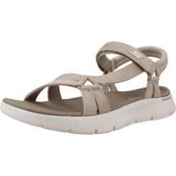 Sandały SKECHERS GO WALK FLEX SANDAL Jasnobrązowy. Brązowe sandały damskie Skechers, bez wzorów, z materiału, bez obcasa, bez zapięcia. Za 199.99 zł.