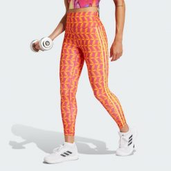 Legginsy adidas x FARM Rio 7/8. Czerwone legginsy damskie Adidas, xs, bez wzorów, z materiału. W wyprzedaży za 139.50 zł.