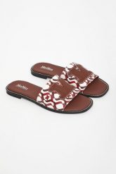 Klapki damskie skórzane Dovere MAX MARA BEACHWEAR. Klapki damskie Max Mara Beachwear, bez wzorów, bez obcasa, bez zapięcia. Za 979.00 zł.