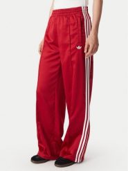 Adidas Spodnie dresowe Satin Sst Loose Trackpant KS7338 Czerwony Relaxed Fit. Czerwone spodnie dresowe damskie Adidas, xl, bez wzorów, z dresówki. Za 349.99 zł.