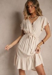 Beżowa Kopertowa Sukienka z Wiskozy Ozdobiona Paskiem Lanestea. Brązowe sukienki damskie Renee, z aplikacjami, z wiskozy, eleganckie, bez ramiączek. W wyprzedaży za 47.99 zł.