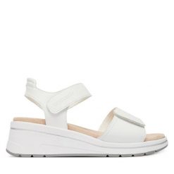 Sandały Caprice. Białe sandały damskie Caprice, bez wzorów, bez obcasa, na koturnie, bez zapięcia. Za 329.99 zł.