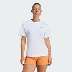 Koszulka adi365 Running Essentials. Białe koszulki damskie Adidas, bez wzorów, bez kołnierzyka, bez ramiączek. Za 109.00 zł.