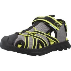 Sandały Geox Model J Sandal Airadyum Bo Kolor Szary. Szare sandały damskie Geox, bez wzorów, z syntetyku, bez obcasa, bez zapięcia. Za 276.59 zł.