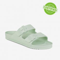 Klapki damskie Coqui z anatomiczną wkładką. Zielone klapki damskie Coqui, bez wzorów, bez obcasa, na płaskiej podeszwie, bez zapięcia. Za 125.99 zł.