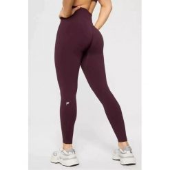 FABLETICS Damskie Legginsy Sportowe Wysoki Stan Seamless Scrunch. Czerwone legginsy damskie FABLETICS, l, bez wzorów, z materiału, z podwyższonym stanem, na fitness i siłownię. Za 299.99 zł.