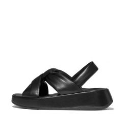 Sandały damskie FitFlop F-Mode Knot Soft-Leather Flatform B/Strap. Czarne sandały damskie Flip Flop, bez wzorów, z materiału, bez obcasa, na płaskiej podeszwie, bez zapięcia. Za 729.50 zł.