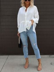 Milan Kiss Bluzka w kolorze białym rozmiar: M. Białe bluzki damskie Milan Kiss, m, bez wzorów, z bawełny, bez kołnierzyka, bez ramiączek. Za 152.99 zł.