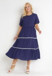 Granatowa Rozkloszowana Sukienka Maxi Wiązana z Tyłu Zathia. Niebieskie sukienki damskie Born2be, w ażurowe wzory, z materiału, bez ramiączek. Za 79.99 zł.