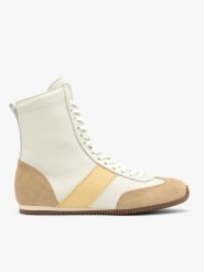 Biało-beżowe buty sportowe za kostkę. Białe obuwie sportowe casual damskie Brawo sp. z o.o., ze skóry, bez zapięcia. W wyprzedaży za 359.99 zł.