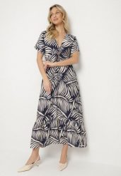 Niebieska Sukienka Wiskozowa Rozkloszowana w Liściasty Print Draledia. Niebieskie sukienki damskie Born2be, bez wzorów, z wiskozy, bez ramiączek. Za 89.99 zł.