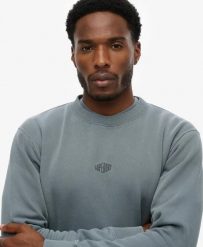 Superdry Micro Logo Crew bluowa bluza Loose Fit. Niebieskie bluzy damskie Superdry, l, bez wzorów, z bawełny, bez kaptura. Za 322.70 zł.