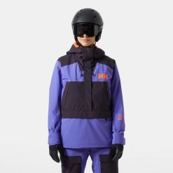 Damska kurtka narciarska Helly Hansen Powchaser Anorak. Fioletowe kurtki damskie Helly Hansen, na zimę, bez wzorów, bez kaptura. W wyprzedaży za 1,002.50 zł.