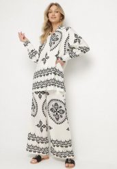 Beżowo-Czarny Wiskozowy Komplet w Etniczny Wzór Koszula i Szerokie Spodnie Pasilia. Brązowe koszule damskie Born2be, na lato, l, z aplikacjami, z wiskozy, eleganckie, bez kołnierzyka, bez ramiączek. Za 129.99 zł.