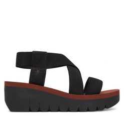 Sandały Fly London. Czarne sandały damskie Fly London, bez wzorów, bez obcasa, na koturnie, bez zapięcia. Za 463.99 zł.