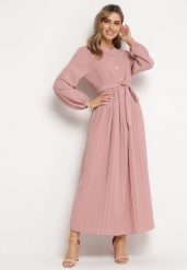 Ciemnoróżowa Rozkloszowana Sukienka Maxi z Plisowanym Dołem i Wiązanym Paskiem Nollira. Czerwone sukienki damskie Born2be, bez wzorów, eleganckie, bez ramiączek. W wyprzedaży za 110.49 zł.