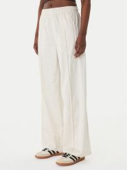 Adidas Spodnie dresowe Pearl Firebird KE3393 Écru Loose Fit. Spodnie dresowe damskie Adidas, l, bez wzorów, z dresówki. Za 349.99 zł.