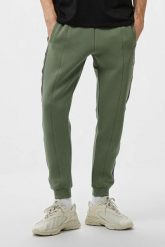 GUESS Zielone męskie spodnie dresowe z lampasami Mickey, Rozmiar XXL. Zielone spódnice damskie Guess, l, z aplikacjami, z bawełny, sportowe. W wyprzedaży za 229.99 zł.