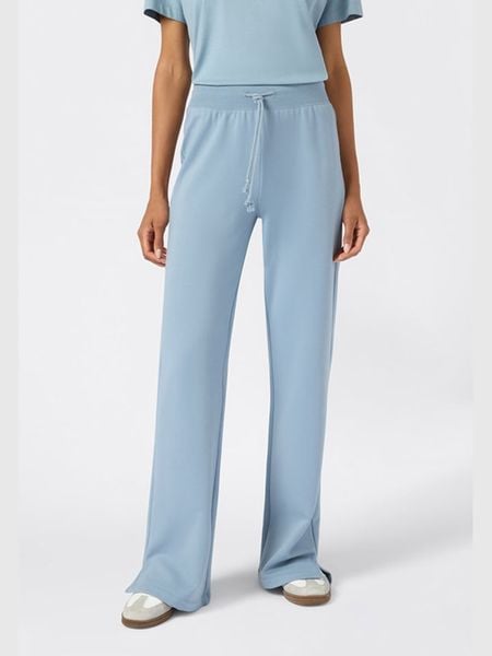 Champion Spodnie dresowe w kolorze błękitnym rozmiar: XL. Niebieskie spodnie dresowe damskie Champion, xl, bez wzorów, z bawełny. Za 109.26 zł.